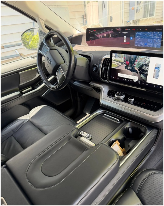 Ford Expedition cab with cleaned leather seats, console and screens